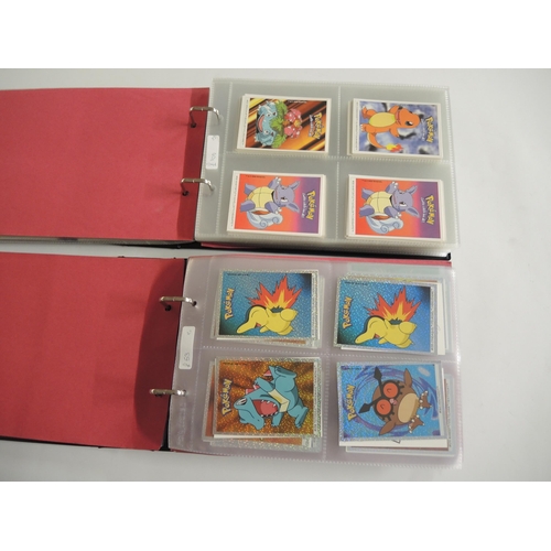 232 - Two albums containing Pokemon Boomer Super Bubble Gum trading cards, 1995 - 2001 including Holo's, t... 