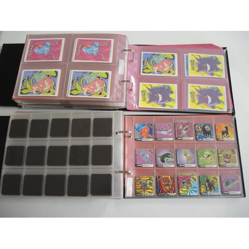 232 - Two albums containing Pokemon Boomer Super Bubble Gum trading cards, 1995 - 2001 including Holo's, t... 