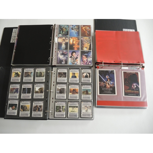 233 - Group of five albums containing Topps Star Wars trading cards including various sets