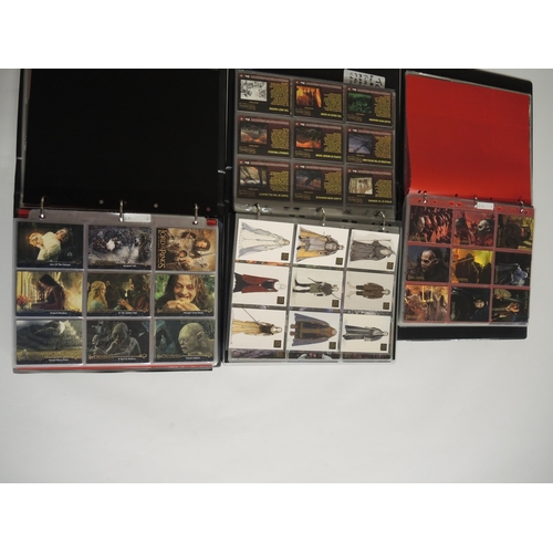 237 - Group of four albums containing Topps Lord of the Rings trading cards including some autograph cards... 