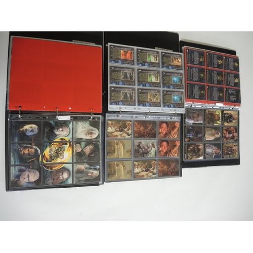 237 - Group of four albums containing Topps Lord of the Rings trading cards including some autograph cards... 