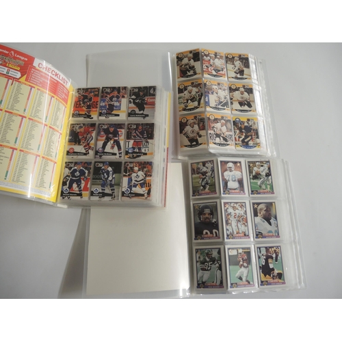 239 - Two albums containing Pro Set hockey, racing, together with another album containing Bowman 1991 Ame... 