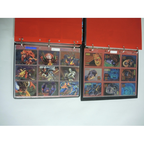 241 - Four albums containing Fleer trading cards including Batman, Marvel, Casper etc.