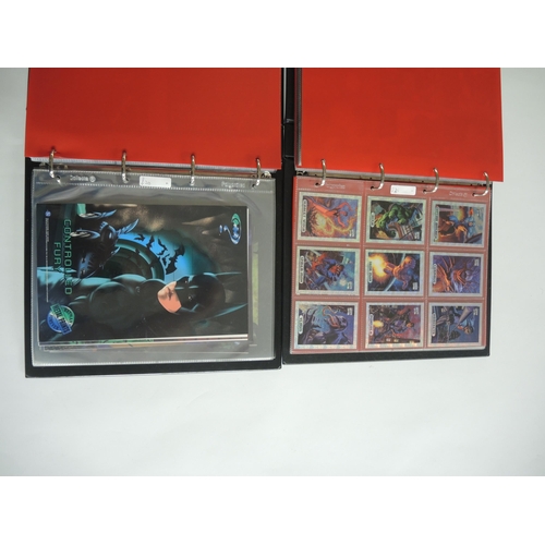 241 - Four albums containing Fleer trading cards including Batman, Marvel, Casper etc.