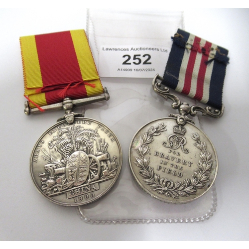 252 - Victorian China War medal 1900 (renamed), together with a George V military medal for bravery in the... 