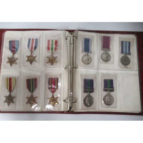 253 - Two albums of World War I and II medals