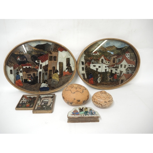 319 - Box containing a collection Peruvian oval hand painted trays, two potto's, etc.