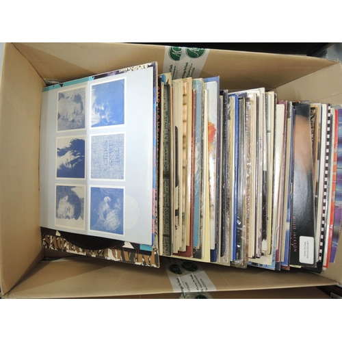 335 - Four boxes containing a large quantity of LP records, mainly 1970's and 80's, including The Beatles ... 