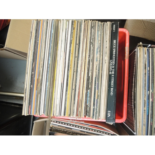 335 - Four boxes containing a large quantity of LP records, mainly 1970's and 80's, including The Beatles ... 