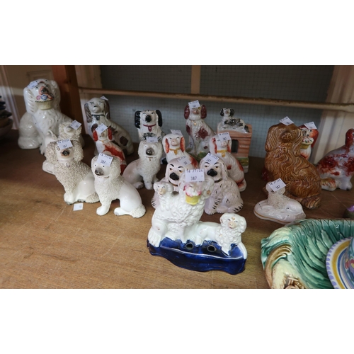 387 - Four pairs of small 19th Century Staffordshire figures of seated spaniels, pair of porcelain figures... 