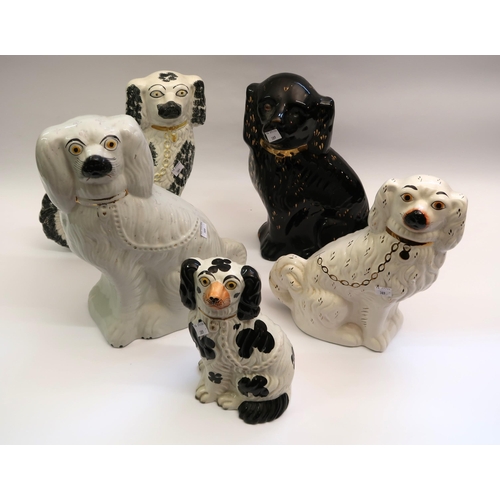 389 - Ten various 19th and 20th Century Staffordshire figures of seated spaniels