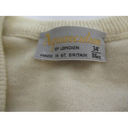 42 - Aquascutum of London at Harrods, ladies wool coat with matching scarf (no size label), together with... 