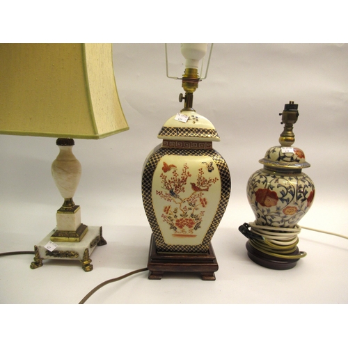 427 - Group of four various porcelain and onyx table lamps and a quantity of shades