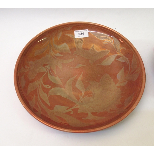 524 - Orange lustre charger by Jonathan Chiswell Jones decorated with fish and a lustre vase decorated wit... 