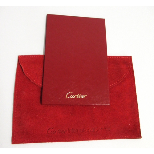 56 - Cartier receipt case in suede pouch, together with a DKNY ladies wallet