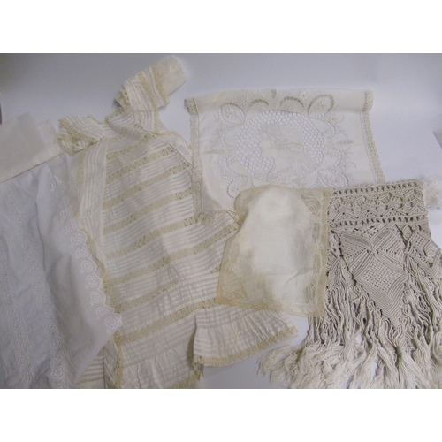 61 - Box containing various linen, lace, crochet work, and embroidery  including Christening gowns, table... 