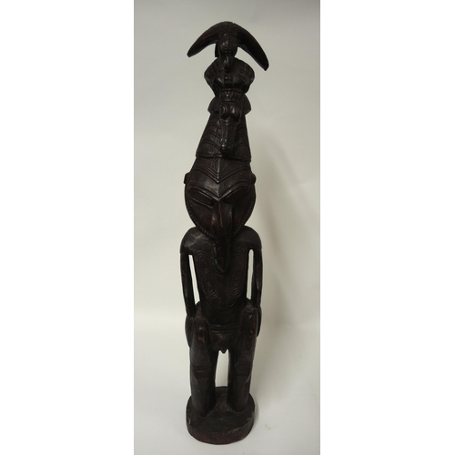 66 - Papua New Guinea, carved wooden Sepik ancestral figure, 64cm high