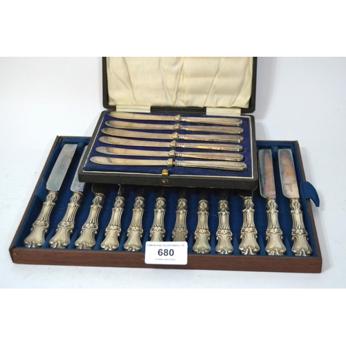 680 - Set of six silver handled dessert knives and forks together with a set of six Sheffield silver handl... 