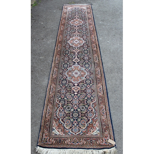 7 - Indian Persian pattern runner with three central medallions and multiple borders, 360cm x 75cm