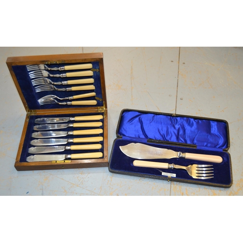 700 - Cased set of silver plated fish knives and forks and a pair of servers