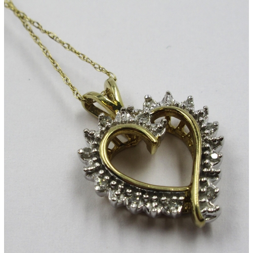 730 - 10ct Yellow gold heart shaped pendant on 10ct gold chain, 2.6g