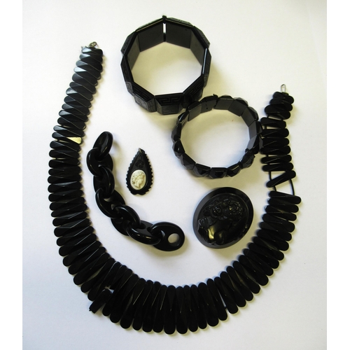 734 - Quantity of jet jewellery including a fringe necklace, two jet bracelets and a jet pendant