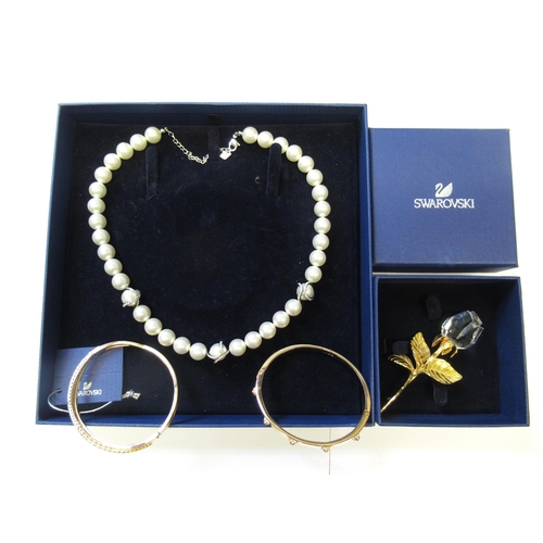 737 - Quantity of Swarovski jewellery including two bangles