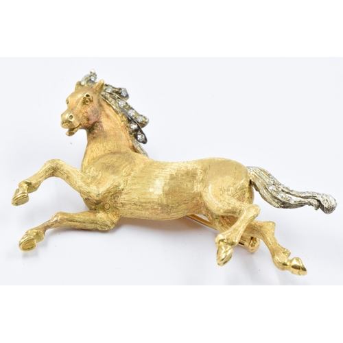 738 - 18ct Yellow and white gold diamond chip set brooch in the form of a galloping horse, 17g