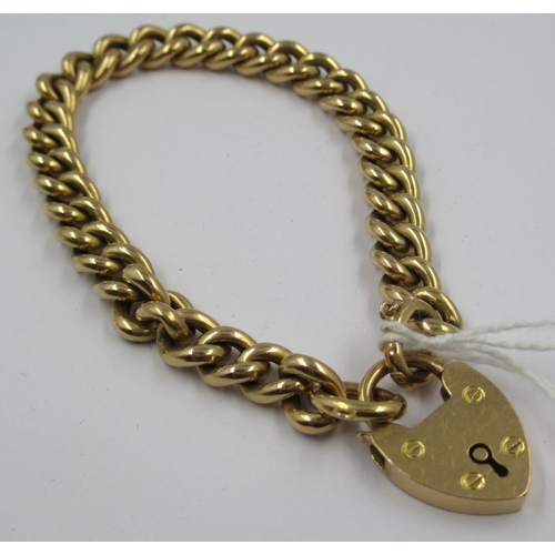 751 - 15ct Gold curb link bracelet with padlock clasp, 15.5g