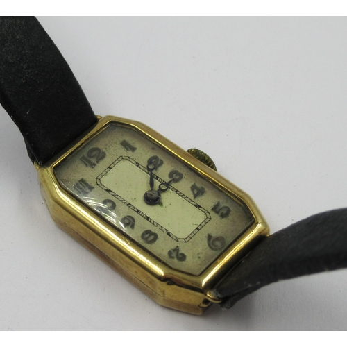 779 - 9ct Yellow gold ladies wristwatch with leather strap, 13.8g gross weight