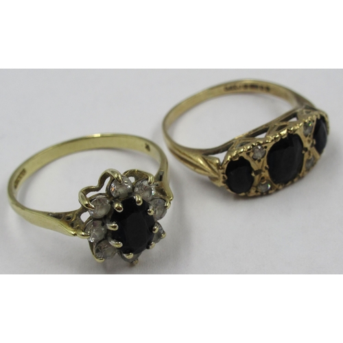 785 - 9ct Yellow gold ring set cubic zirconia and sapphire, size N.5, 2.1g, together with another similar,... 