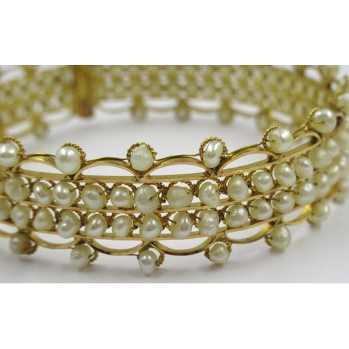 788 - Middle Eastern yellow metal and pearl bangle, 21.5g