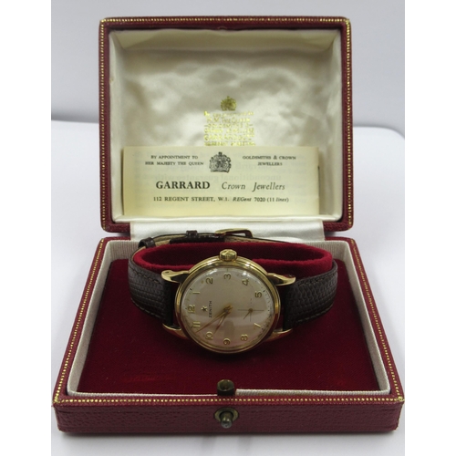 819 - Zenith 9ct Yellow gentleman's wristwatch with subsidiary seconds and leather strap, in associated bo... 