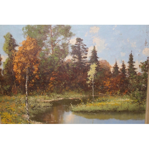 879 - 20th Century oil on canvas, river scene with trees, indistinctly signed, 49 x 59cm together with an ... 