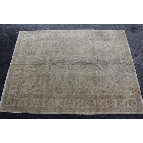 9 - Chobi carpet of floral design with multiple borders on beige ground, 370cm x 278cm