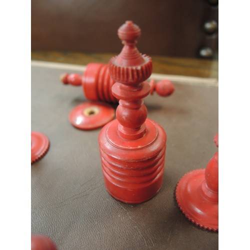 108 - 19th Century carved bone natural and red stained chess set, in later box