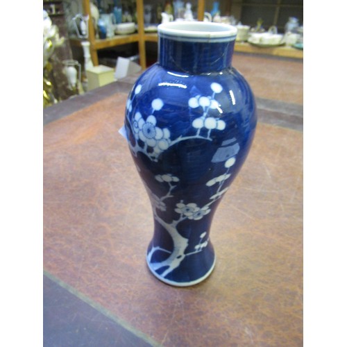 489 - Chinese baluster form vase with cover, blue and white decorated with dragons, 35cm high, together wi... 