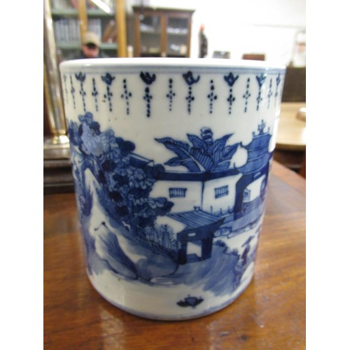 511 - Chinese ceramic brush pot, blue and white decorated with a river landscape, 14cm high, 13cm diameter