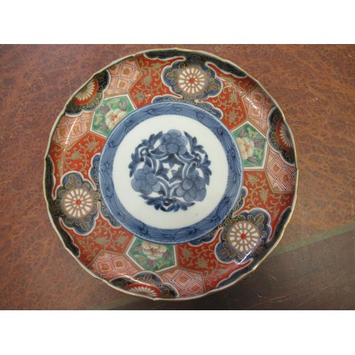 570 - Japanese circular charger blue and white decorated with bamboo and flowers, 31cm diameter, together ... 