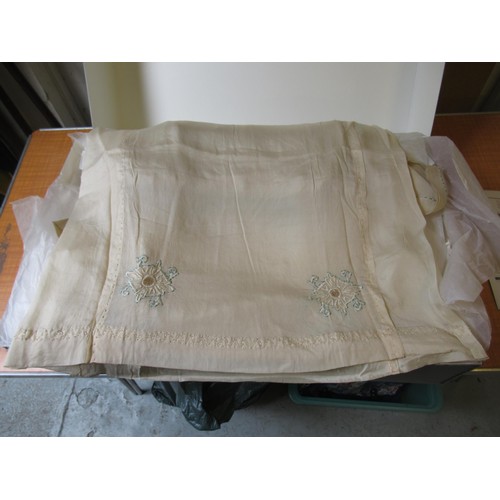 61 - Box containing various linen, lace, crochet work, and embroidery  including Christening gowns, table... 