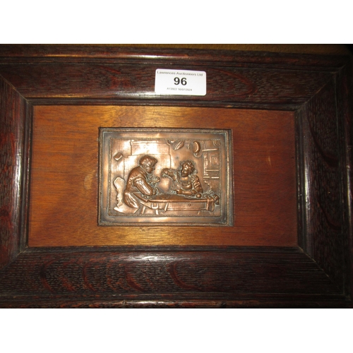 96 - Small rectangular embossed copper plaque, figures in an interior, oak framed, 8 x 10cm