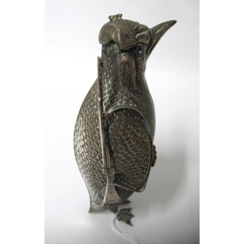 274 - Unusual silver plated German figure of a penguin holding a rifle with jewel inset eyes, circa 1900, ... 