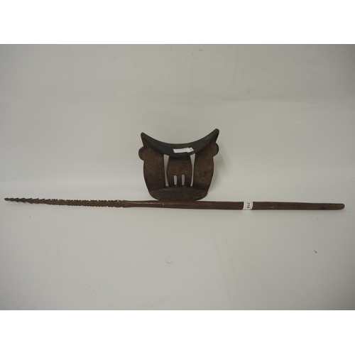 310 - Polynesian ceremonial dance spear, 84cm long, together with a native wooden headrest