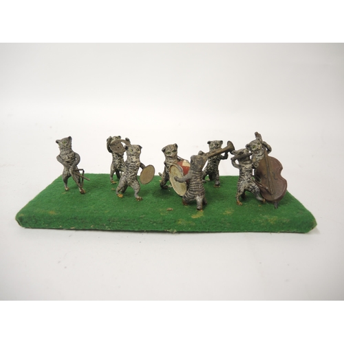 330 - Viennese cold painted spelter eight piece cat band