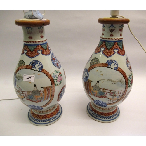 Pair of Japanese enamel decoration baluster form vases, converted to table lamps, decorated with panels of figures in landscapes (cut down), 40cm high each