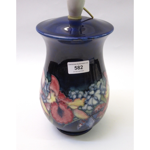 582 - Moorcroft Orchid pattern baluster form pottery table lamp, 24cm high