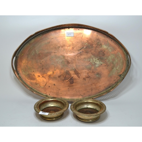 609 - Pair of 19th Century circular plated on copper wine bottle coasters, together with an oval plated ga... 