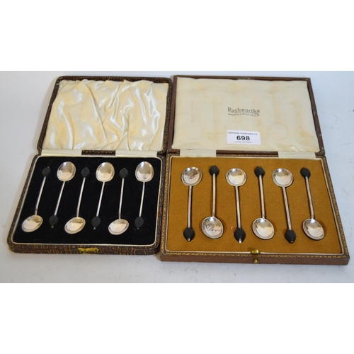 698 - Two cased sets of silver coffee spoons