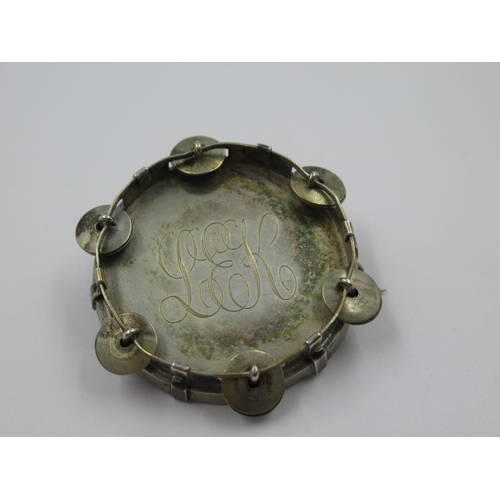 739 - Silver brooch in the form of a tamborine bearing monogram LEK