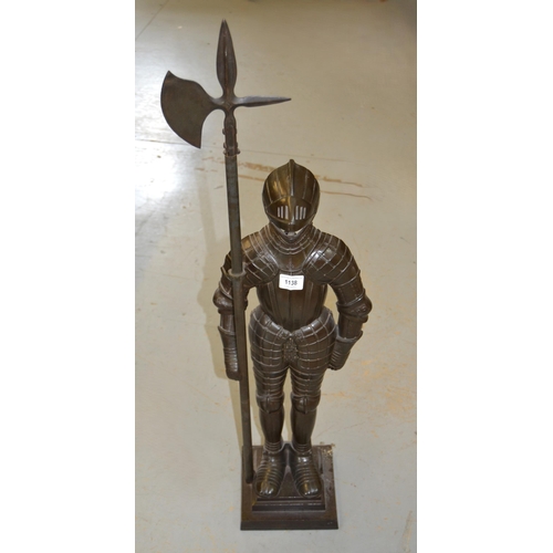 1138 - Cast patinated metal fireside tool set in the form of a knight in armour, 89cm high